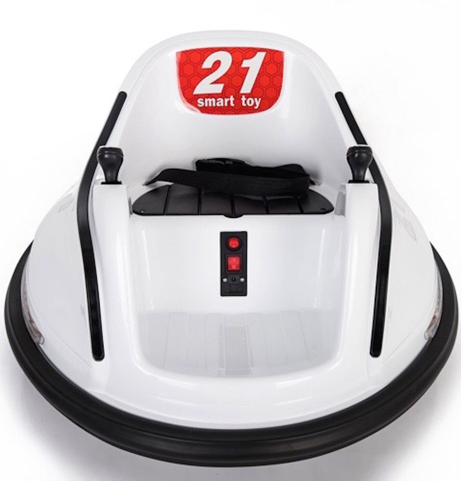 White 12V kids ride-on Waltzer car from Electric Ride On Cars, featuring spinning wheels and fun design for young children.