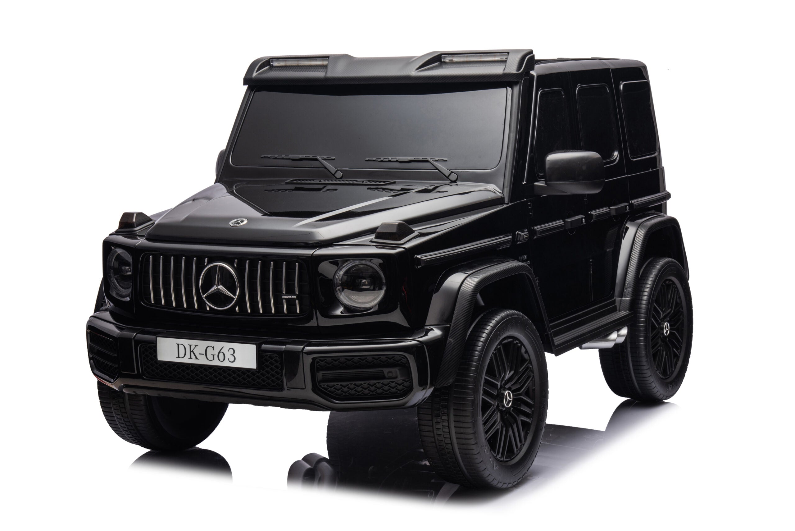 Large Mercedes G63 24V kids ride-on car in black, featuring realistic details and serving as a giant G-Wagon toy vehicle.