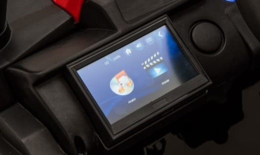 Kids ride-on UTV quad by Electric Ride On Cars with MP4 player, featuring rugged design and bright colors for outdoor play.